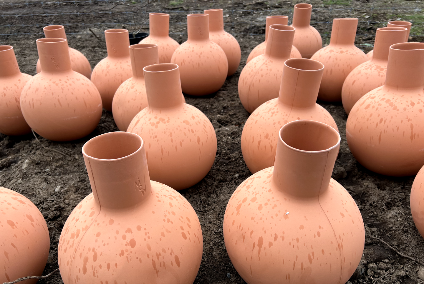 Many large terra cotta pots specially designed to release water